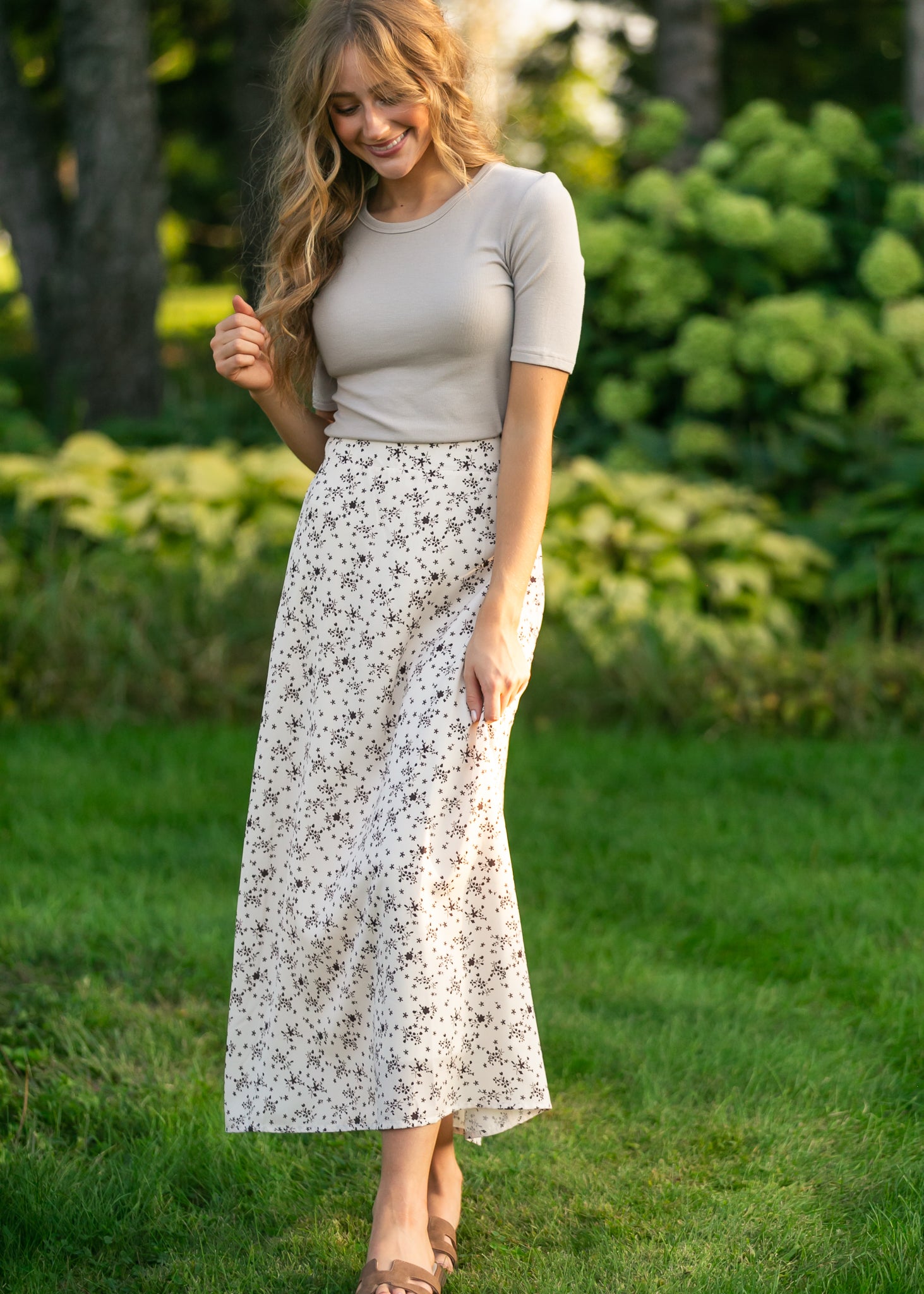 Inherit Co. Braylyn Brown Floral Midi Skirt — lifestyle context