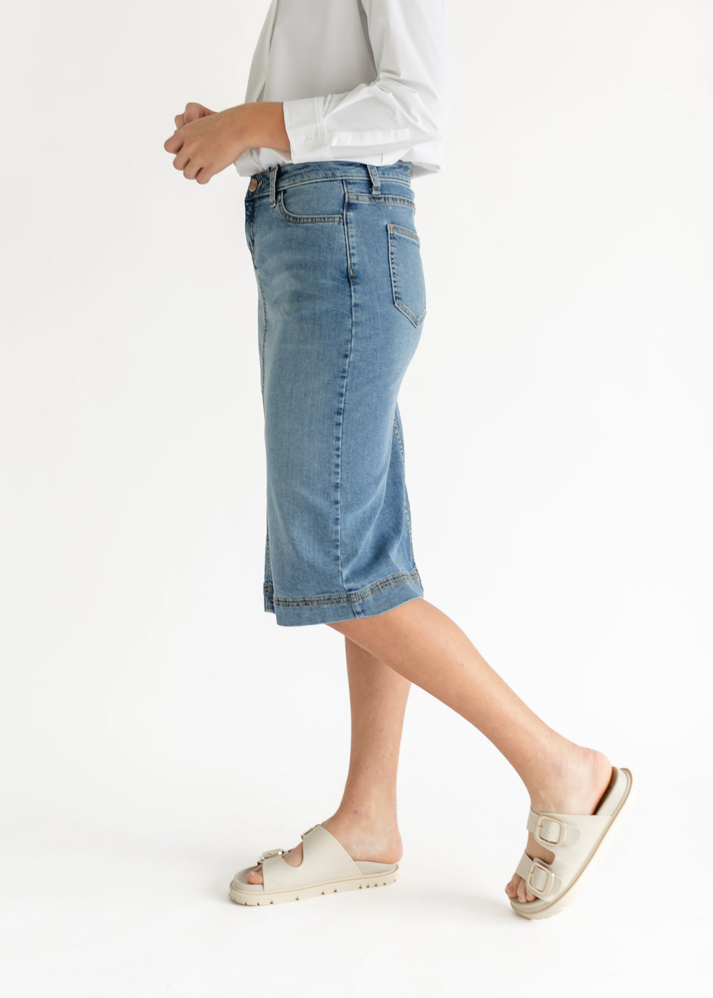 Inherit Co. Bryn Light Wash Denim Midi Skirt — in-use photo