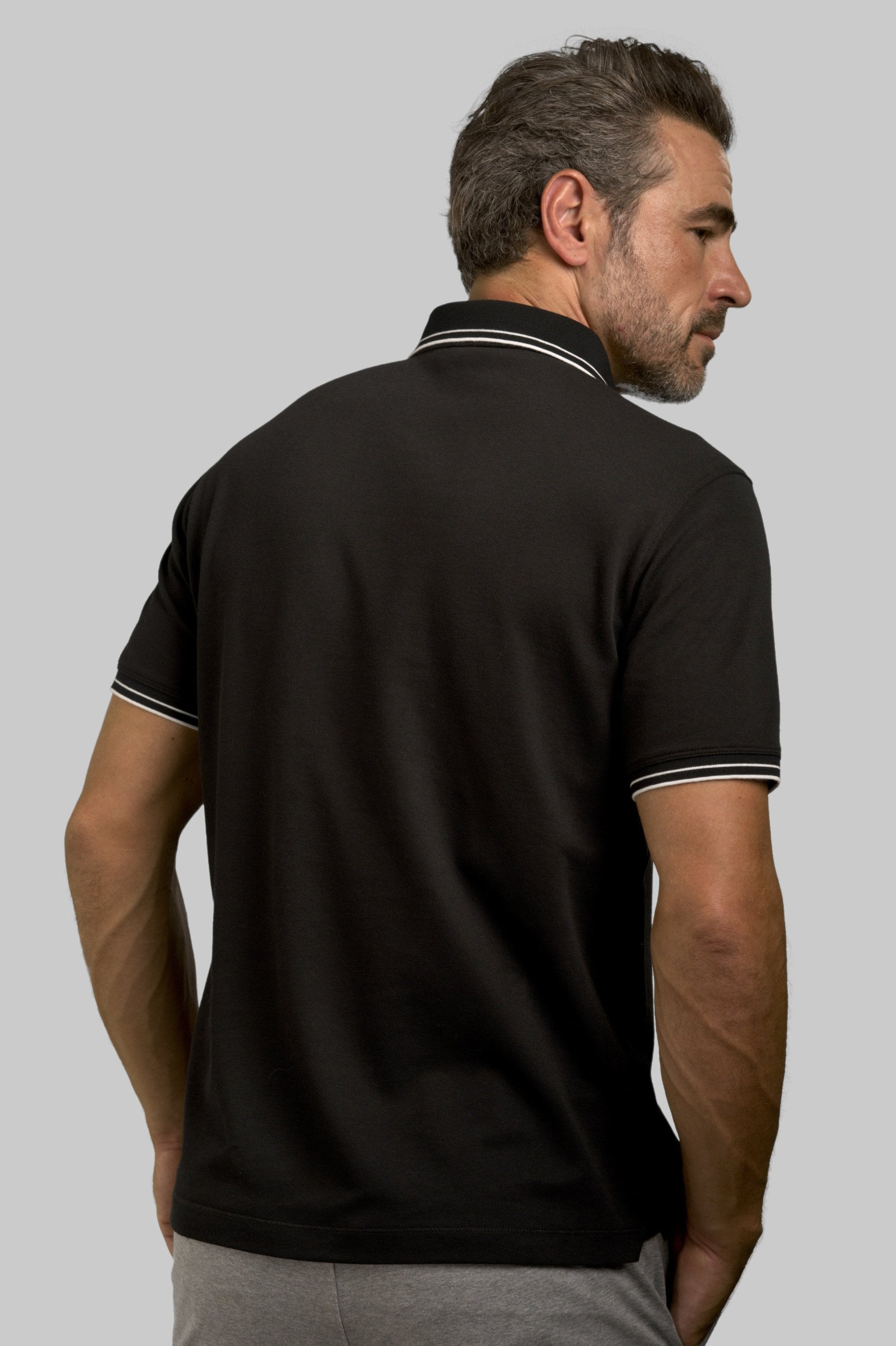 Buki Pocket Polo Shirt - Black — side view