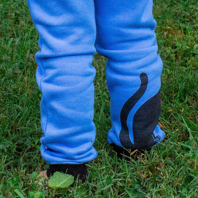 Princess Awesome & Boy Wonder Cat and Yarn Fuzzy Fleece Joggers with Pockets — Princess Awesome & Boy Wonder branding close-up