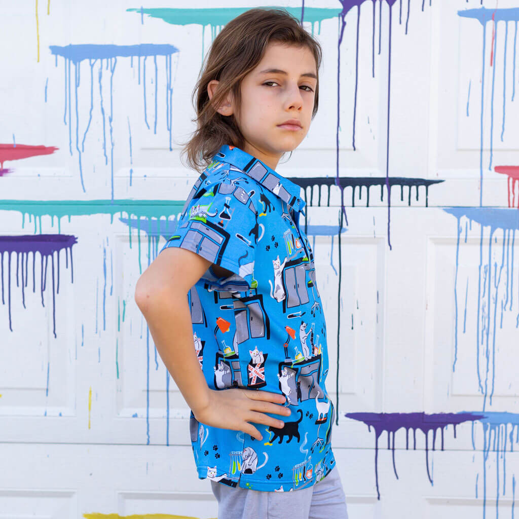Princess Awesome & Boy Wonder "CATalyst" Lab Disasters Short Sleeve Polo Shirt — Princess Awesome & Boy Wonder branding close-up