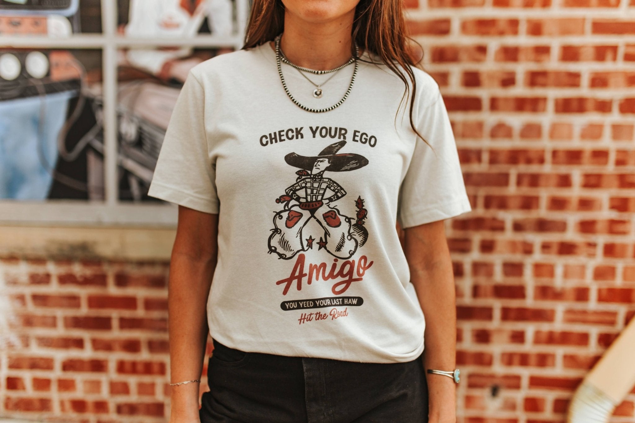 Wild Junkie Check Your Ego Amigo Cowboy Graphic Tee — in-use photo