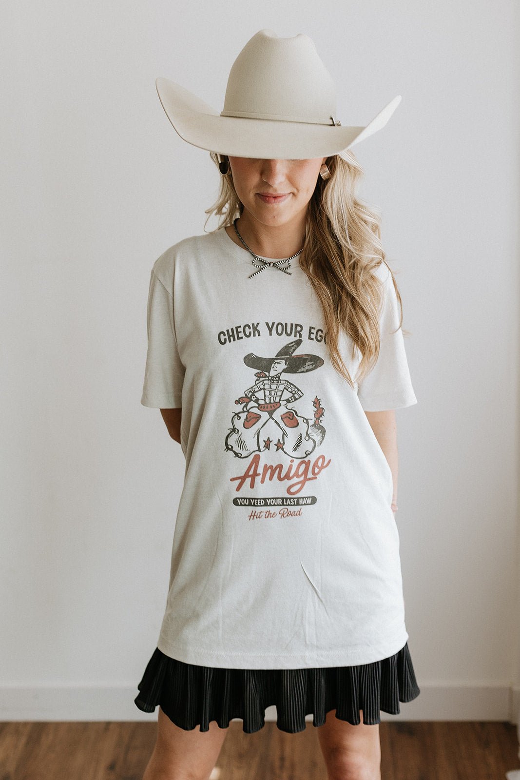 Wild Junkie Check Your Ego Amigo Cowboy Graphic Tee — lifestyle context