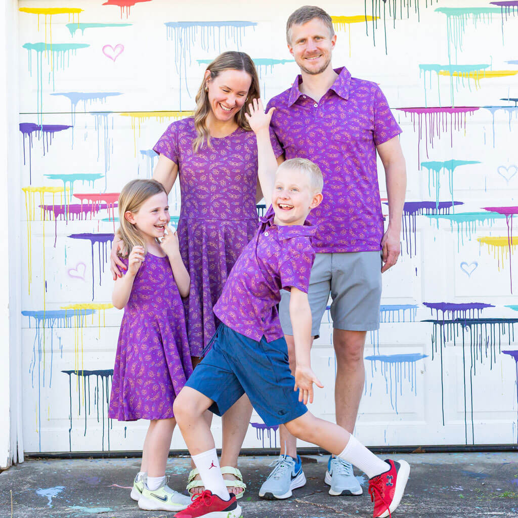 Princess Awesome & Boy Wonder "Emergence" Cicadas Short Sleeve Polo Shirt — Princess Awesome & Boy Wonder branding close-up