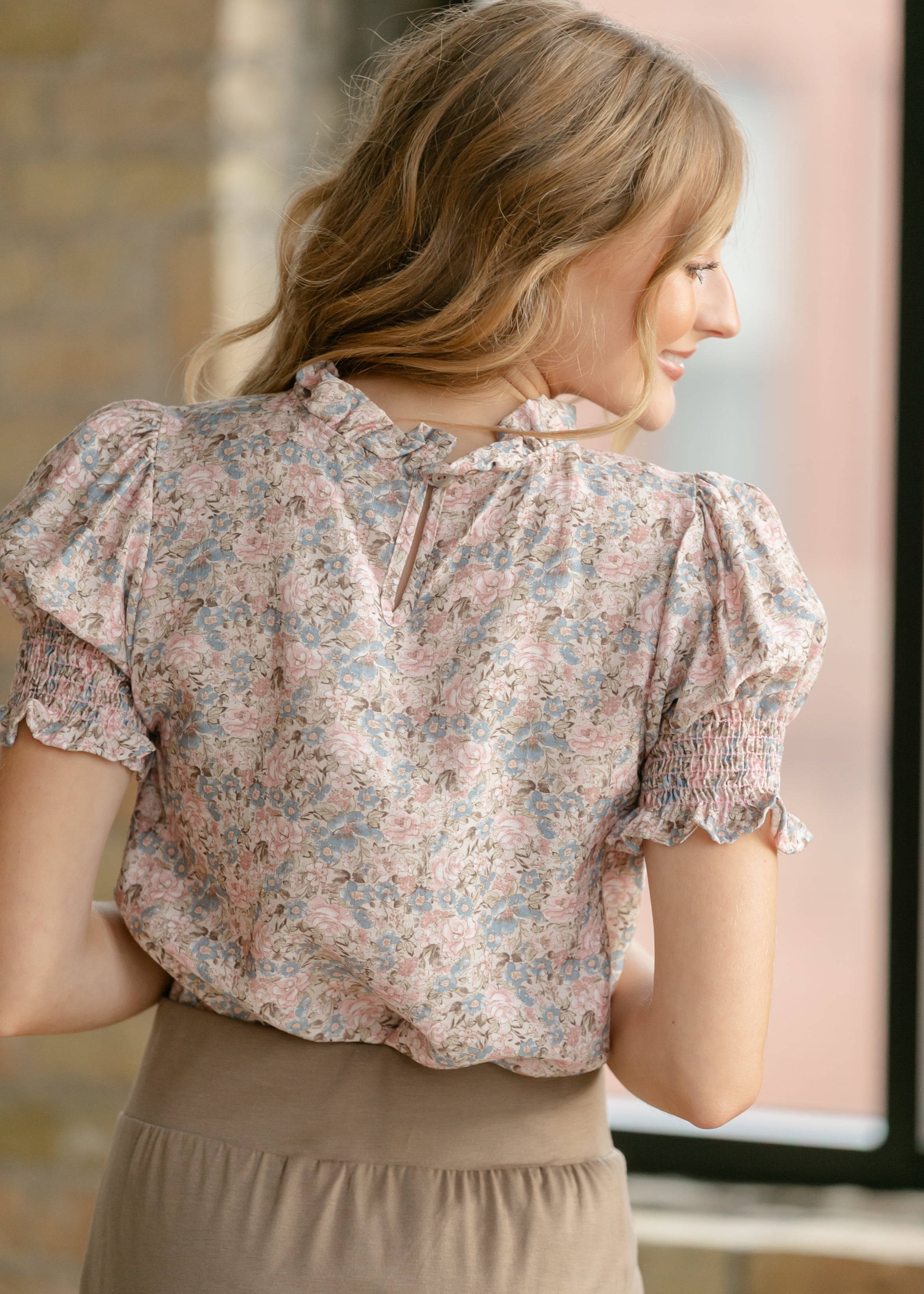 Inherit Co. Clara Floral Ruffle Mockneck Short Sleeve Top — in-use photo