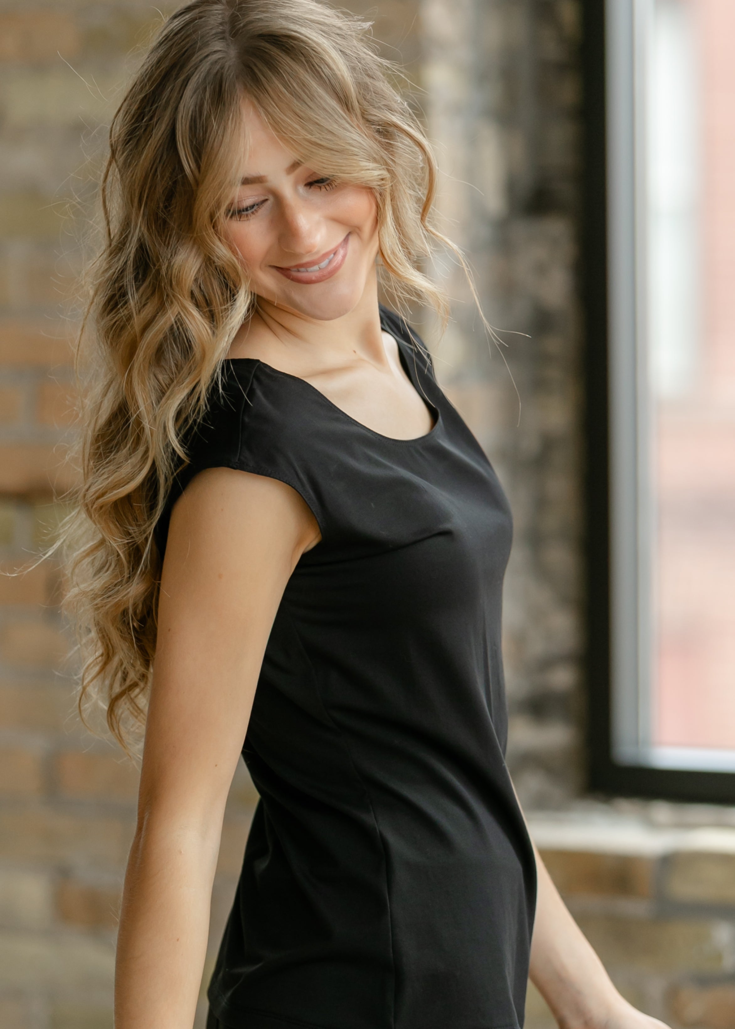 Inherit Co. Classic Black Cap Sleeve Tank — lifestyle context