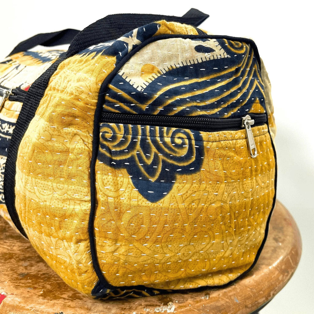 Darn Good Yarn Darn Good Yarn Overnight Kantha Travel Bag — Darn Good Yarn branding close-up
