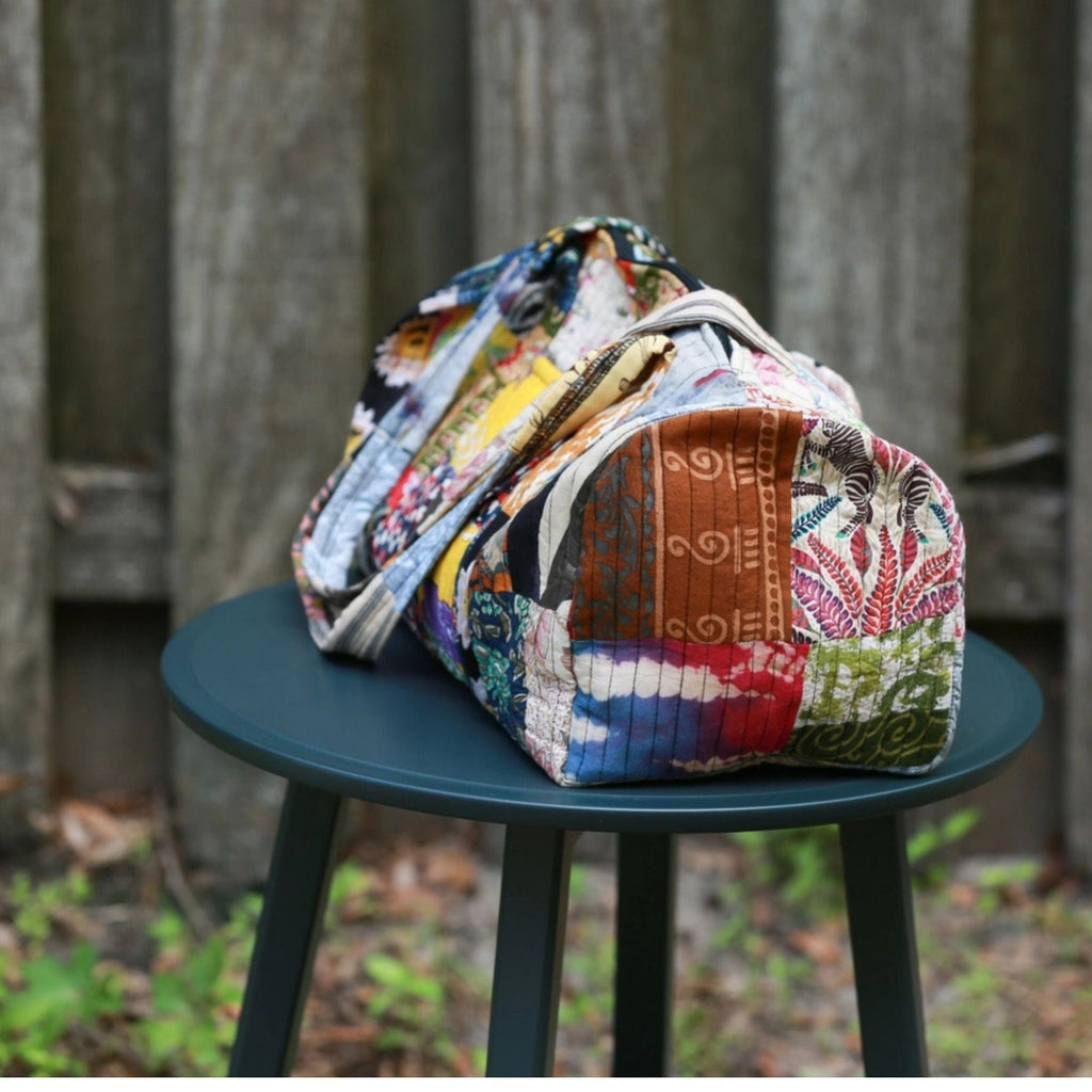 Darn Good Yarn Patchwork Quilted Duffle Bag — clothing and accessories category context
