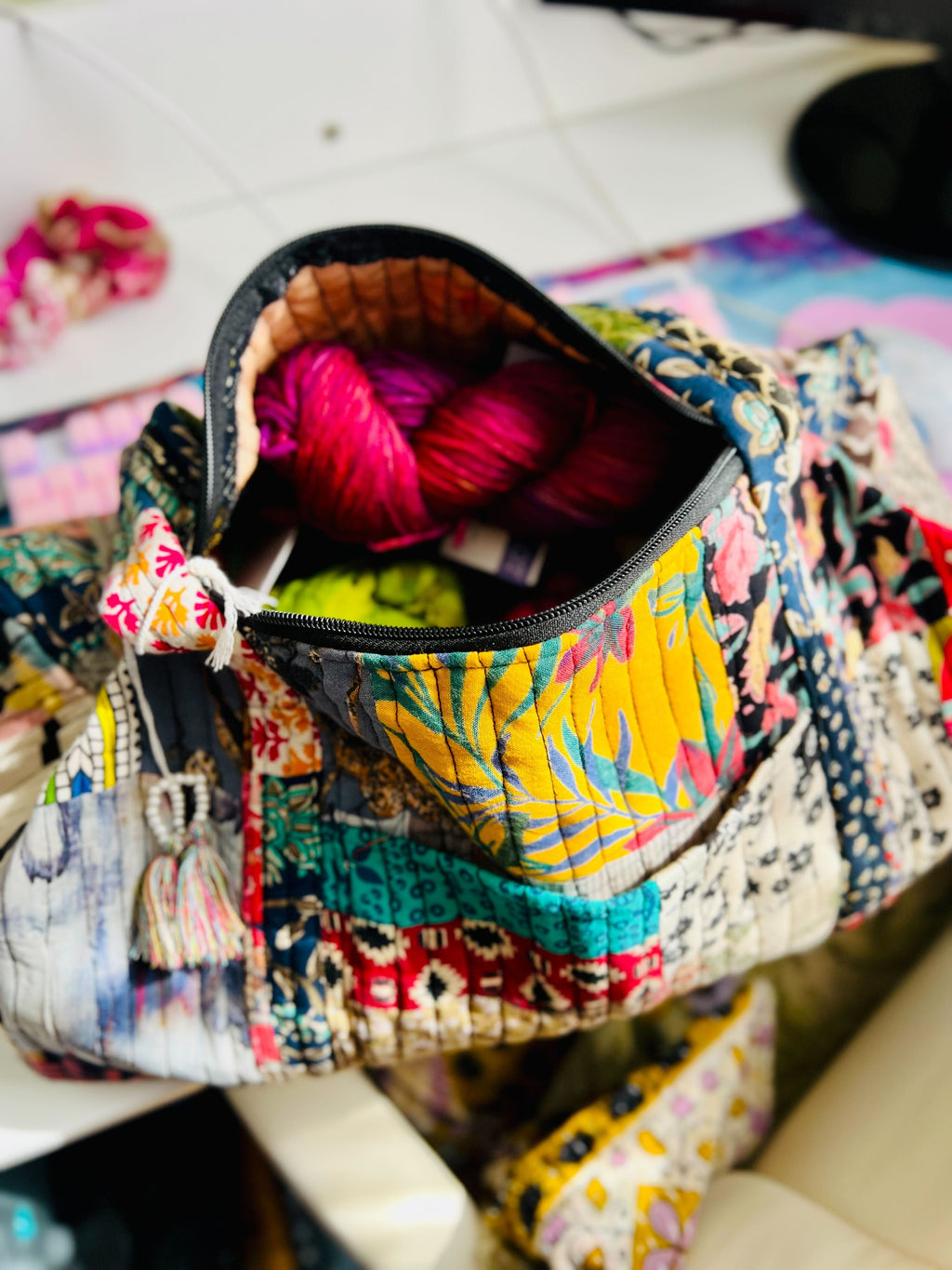Darn Good Yarn Patchwork Quilted Duffle Bag — lifestyle worn / used context