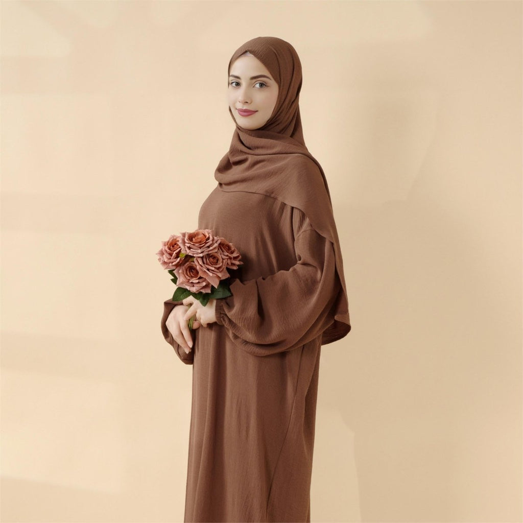 Mariam's Collection Cocoon-Cut Crepe Abaya Perfect For Umrah With One-Piece Hijab Attached (MA143) — Mariam's Collection branding close-up