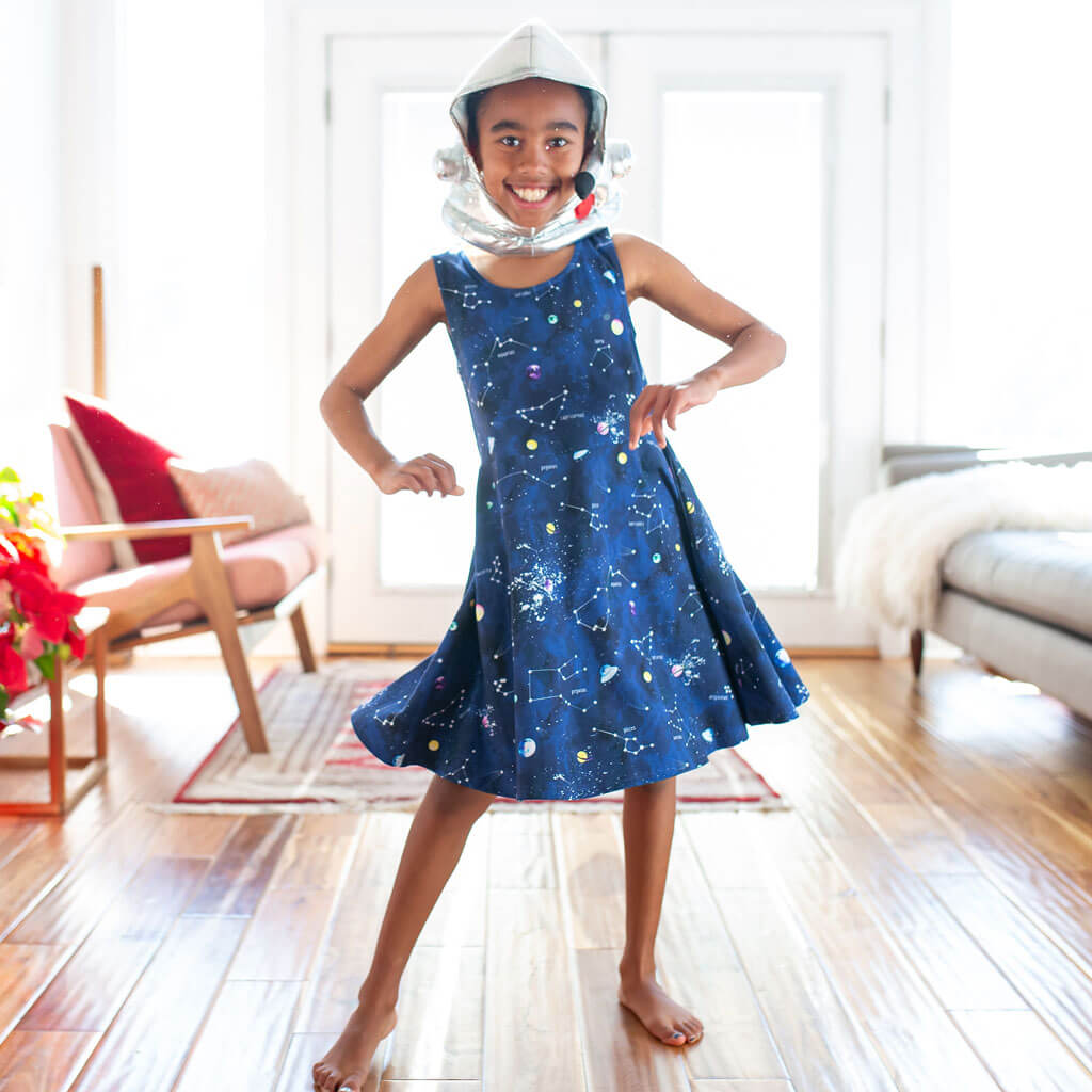Princess Awesome & Boy Wonder "Cosmic Compass" Constellations Sleeveless Play Dress with Pockets — Princess Awesome & Boy Wonder branding close-up