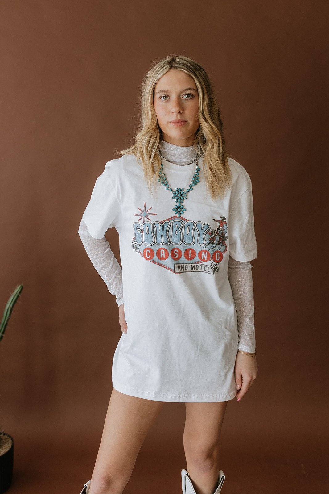 Wild Junkie Cowboy Casino Motel Graphic Tee — lifestyle context
