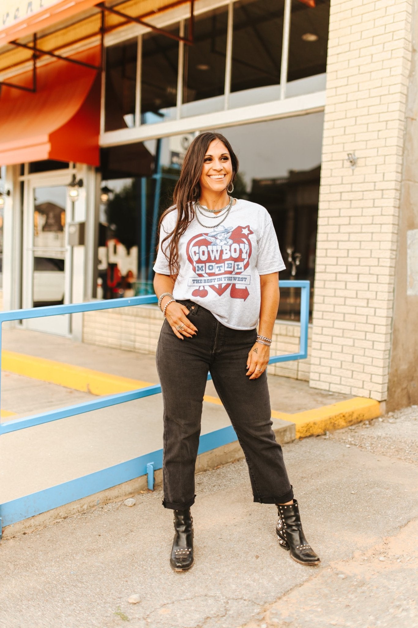 Wild Junkie Cowboy Motel Raw Cut V-neck Graphic Tee — side view