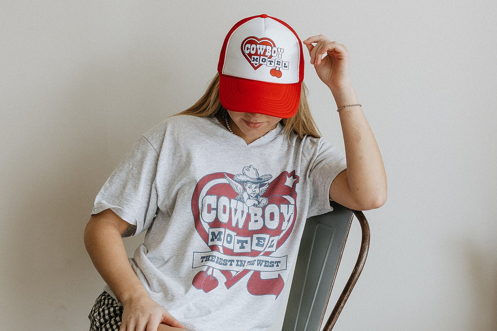 Wild Junkie Cowboy Motel Trucker Hat — main product shot