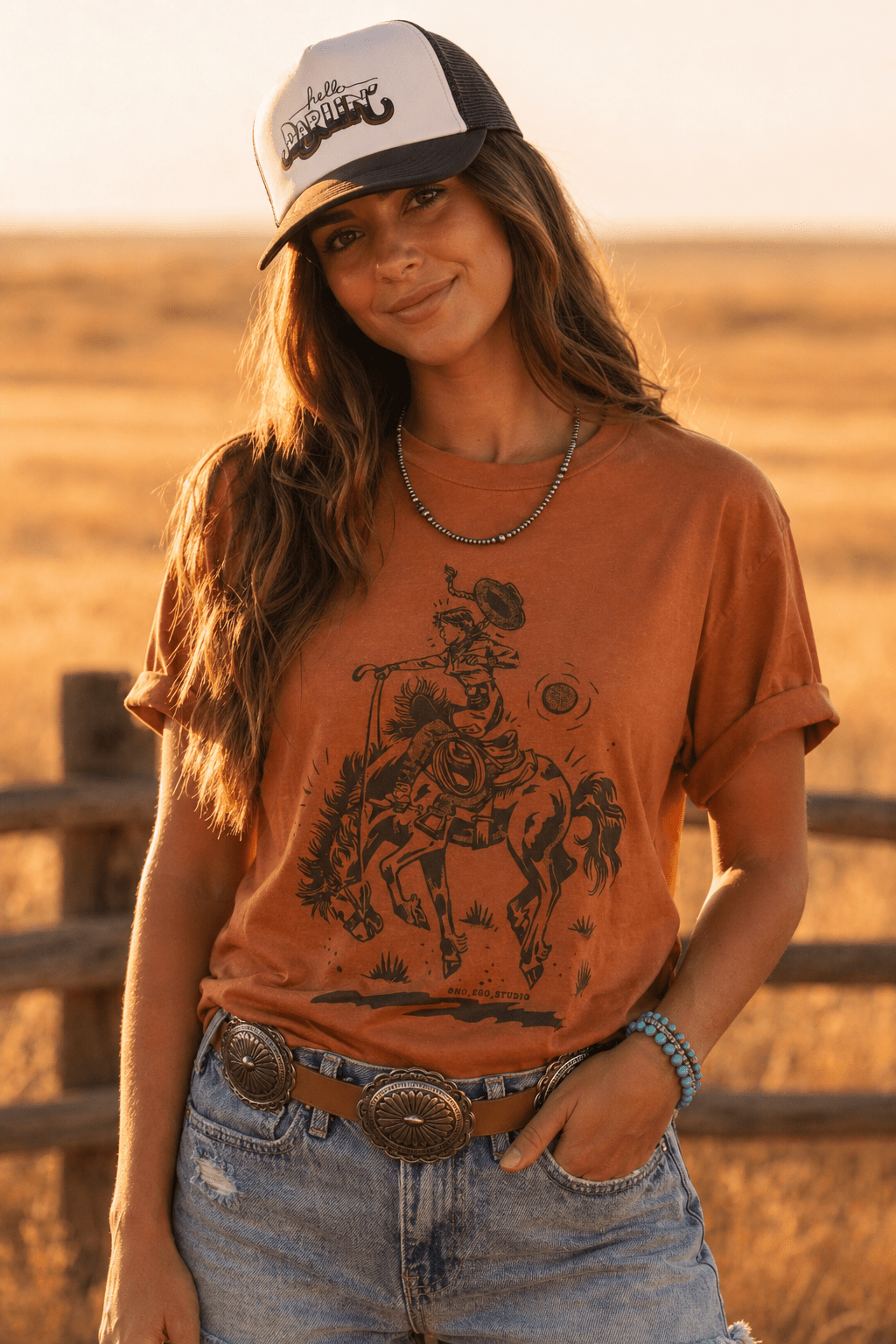 Wild Junkie Cowgirl Rider Graphic Tee — detail close-up