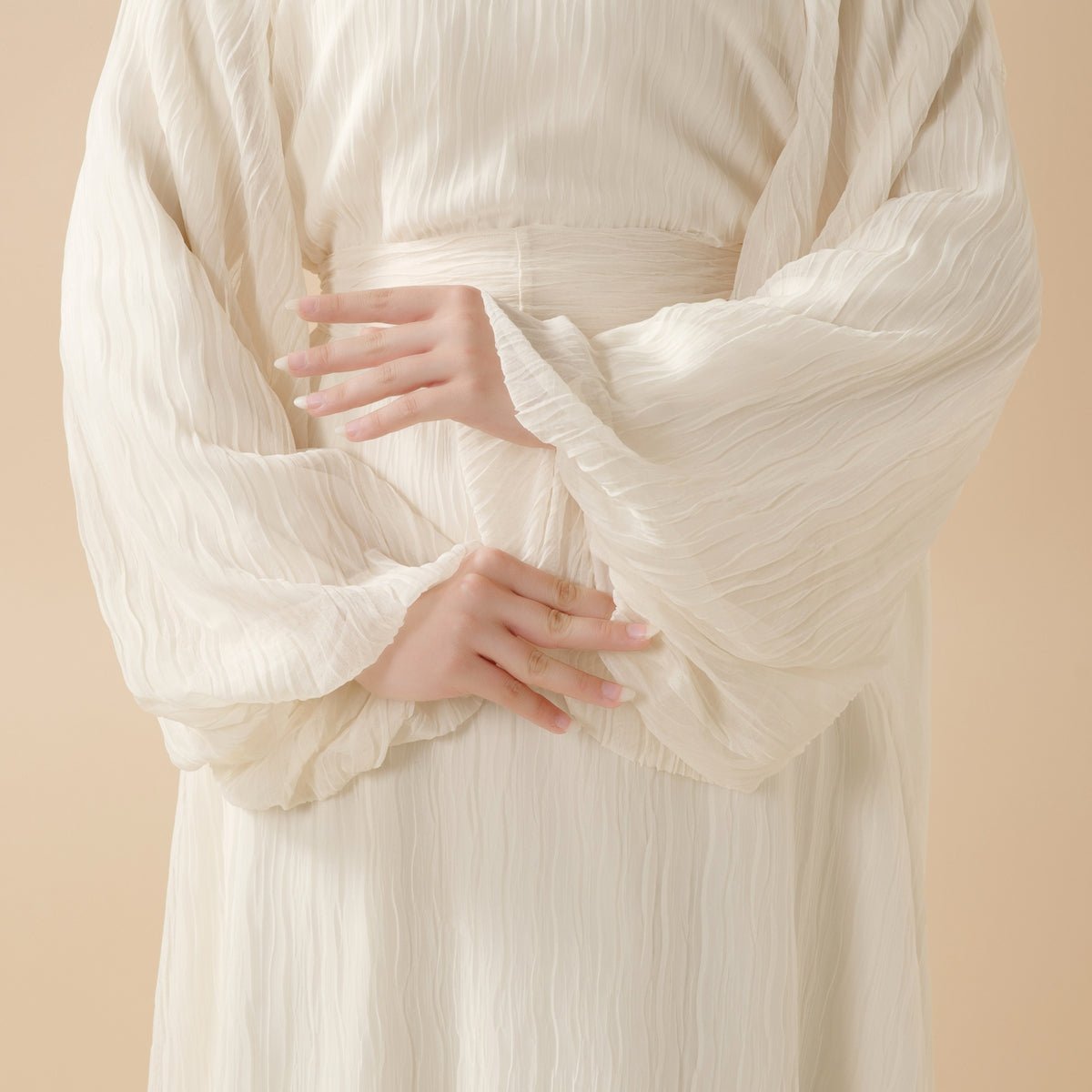 Mariam's Collection Cream White Puff Sleeves Abaya |  Pleat Textured Maxi Dress Abaya (MA152) — Mariam's Collection branding close-up