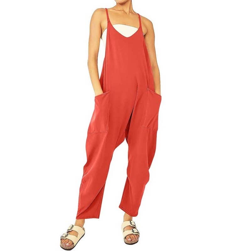Pretty Little Patriot Pretty Little Patriot Feisty Orange jumpsuit overalls — Pretty Little Patriot branding close-up