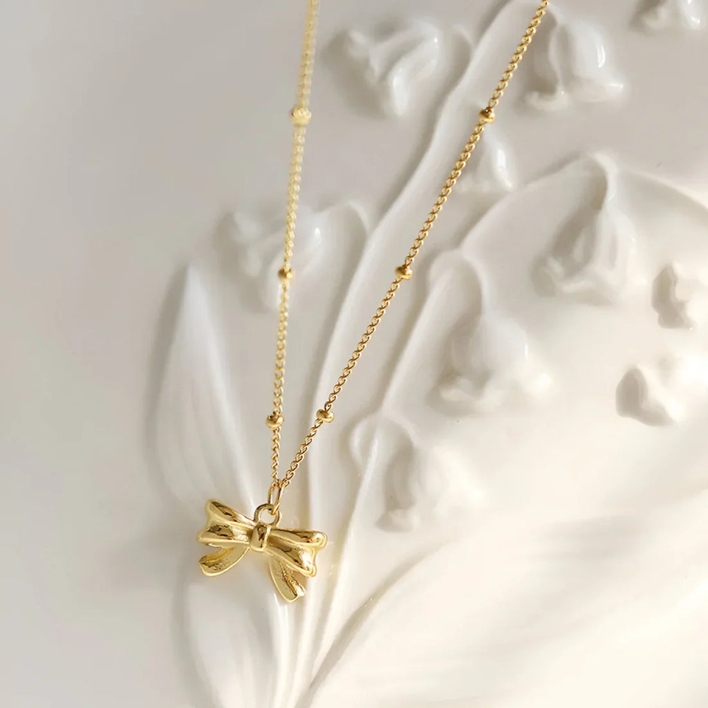 SORI STYLE Dainty Bow Pendant Necklace - Sori Style — in-use photo