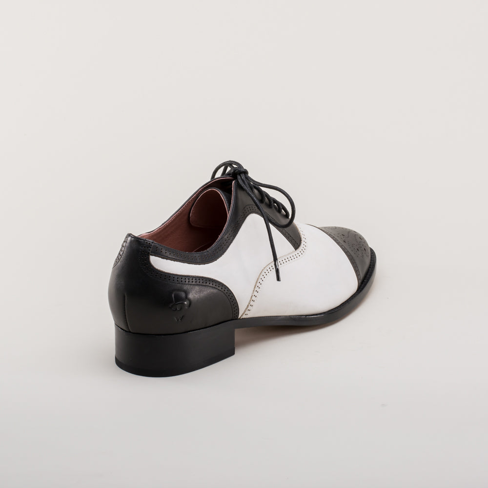 American Duchess Dandy Men's Vintage Cap Toe Oxfords (Black/White) — branding close-up