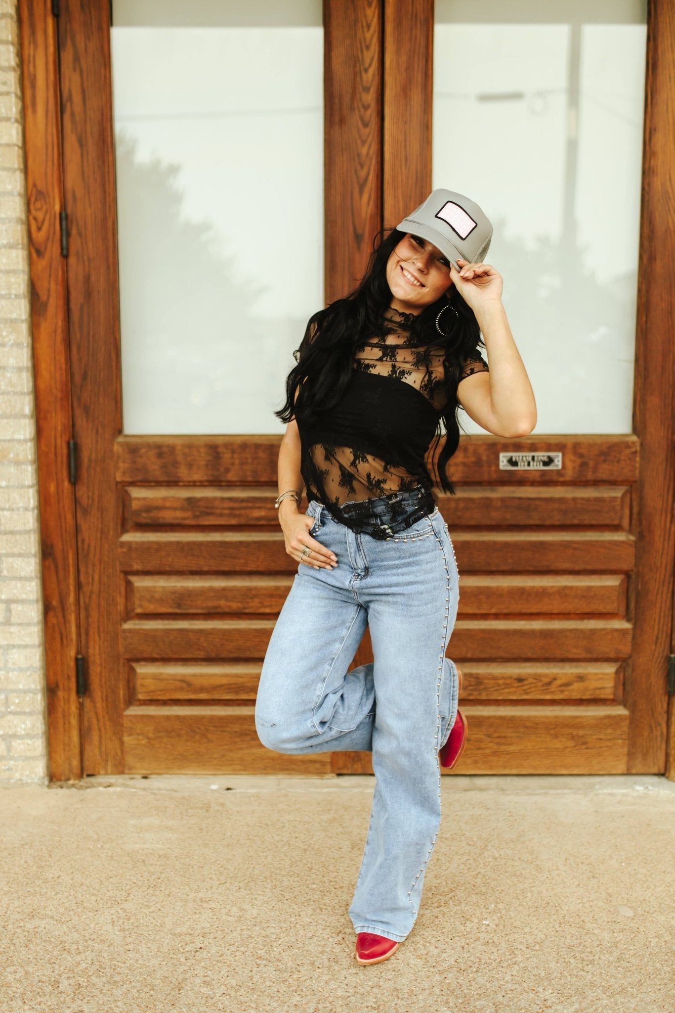 Wild Junkie Darlin' Patch Trucker Hat — Wild Junkie branding close-up
