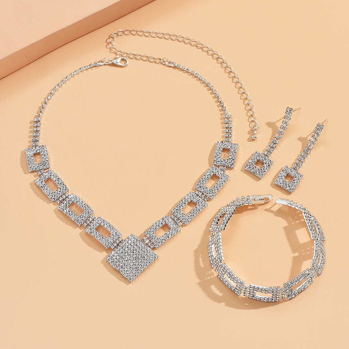 Mariam's Collection Dazzling 3-Piece Full Rhinestones Jewelry Set (MAC317) — Mariam's Collection branding close-up