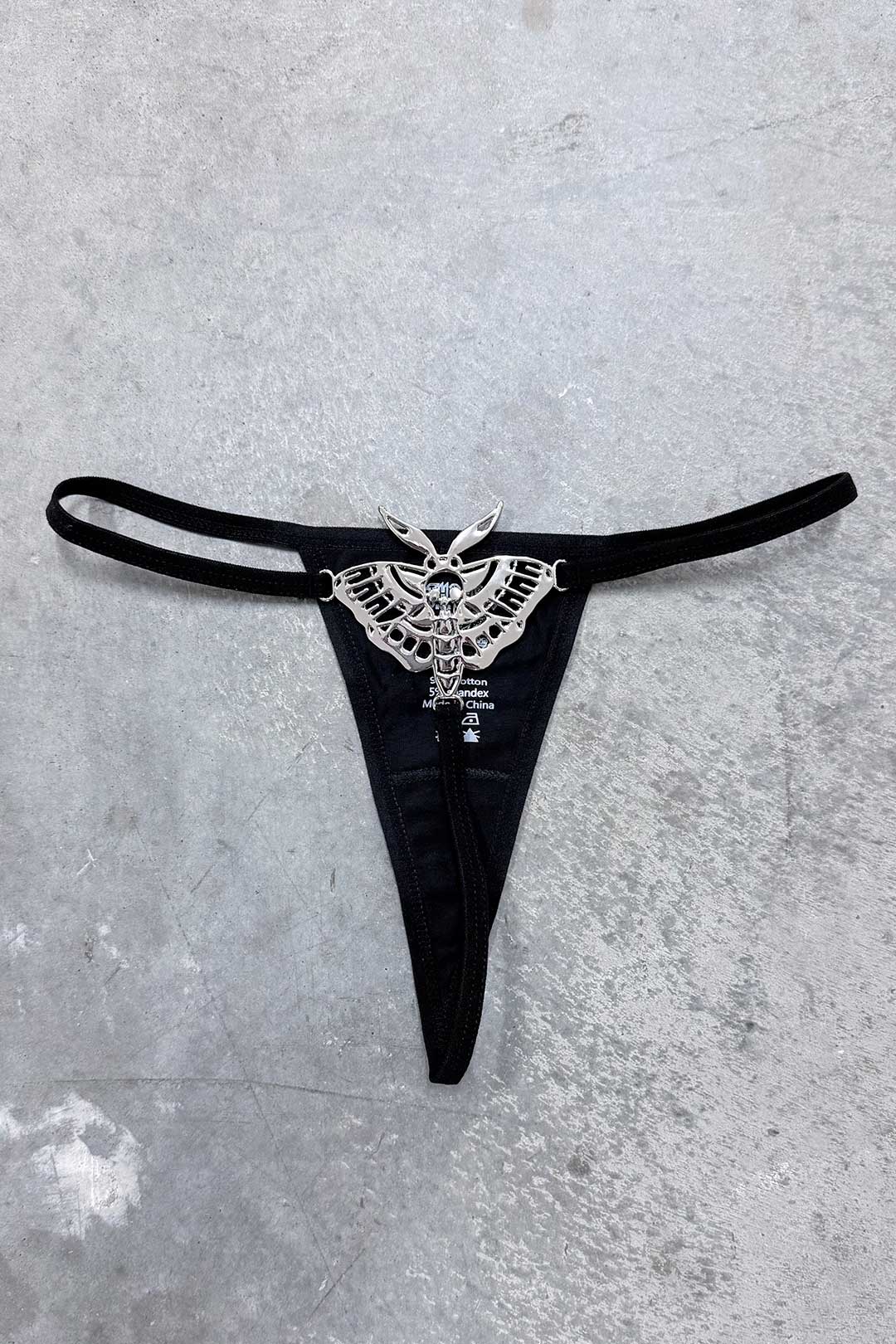 Thrash Happy Death Moth Metal Thong — main product shot