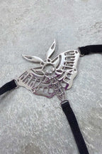 Thrash Happy Death Moth Metal Thong — detail close-up