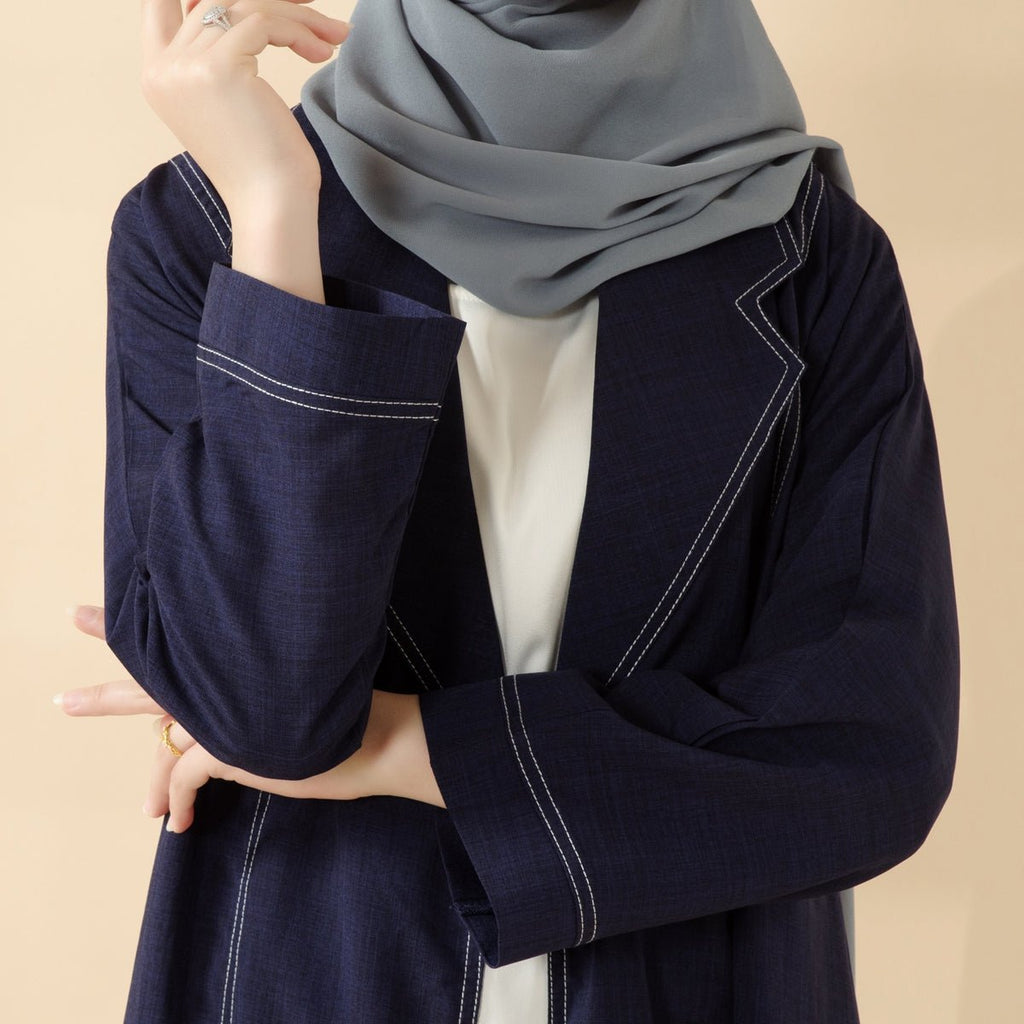 Mariam's Collection Denim Blue Open Abaya | Contrast Stitching Trench Coat Thin Denim Abaya (MOA121) — Mariam's Collection branding close-up