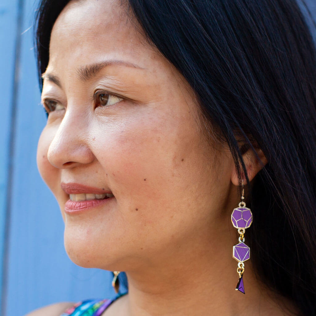 Princess Awesome & Boy Wonder Gaming Dice Earrings — lifestyle worn / used context