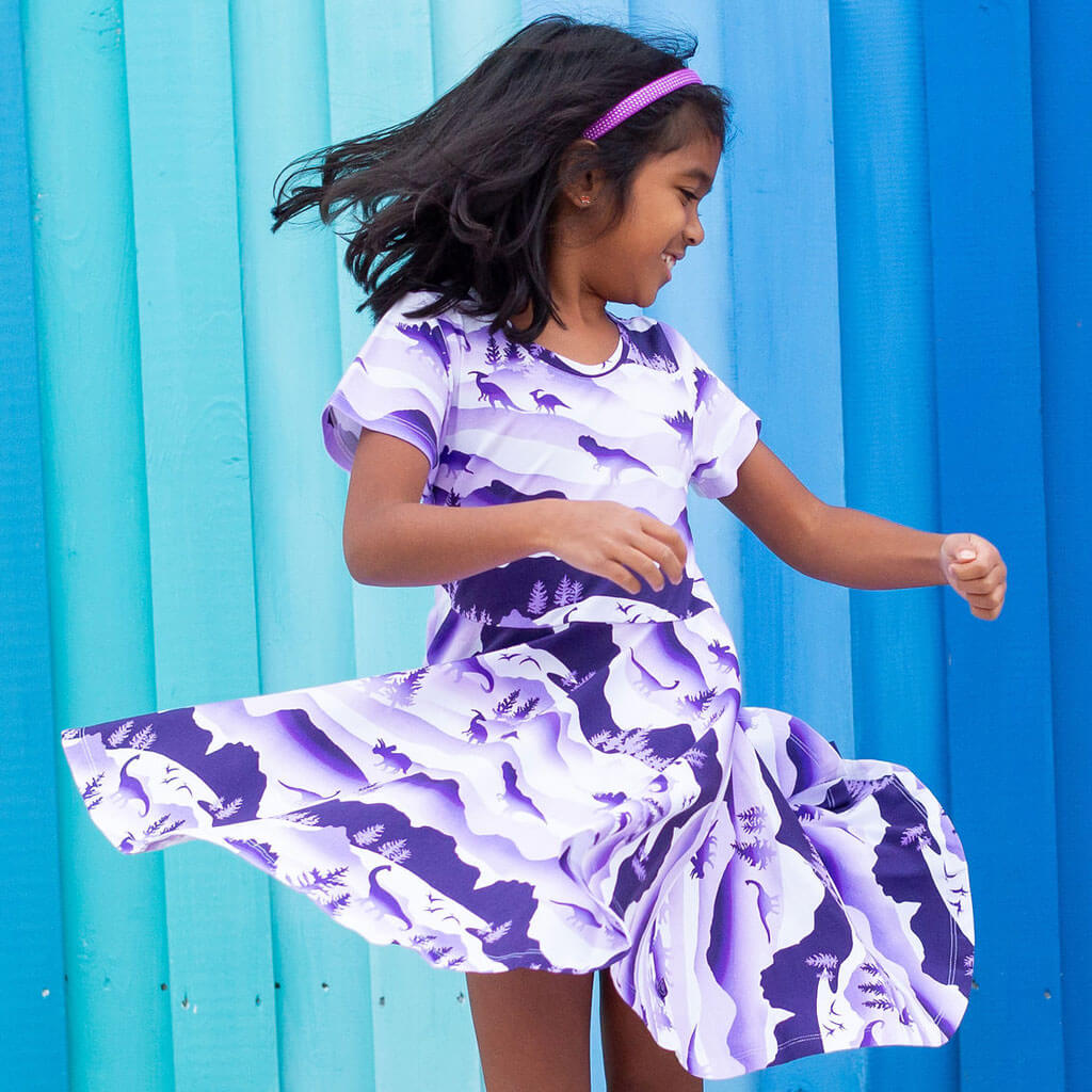 Princess Awesome & Boy Wonder "Dinoscape" Dinosaur Wilderness Super Twirler Dress with Pockets — lifestyle worn / used context