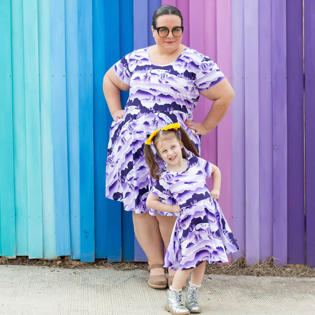Princess Awesome & Boy Wonder Adult "Dinoscape" Dinosaur Wilderness Super Twirler Dress with Pockets — lifestyle worn / used context