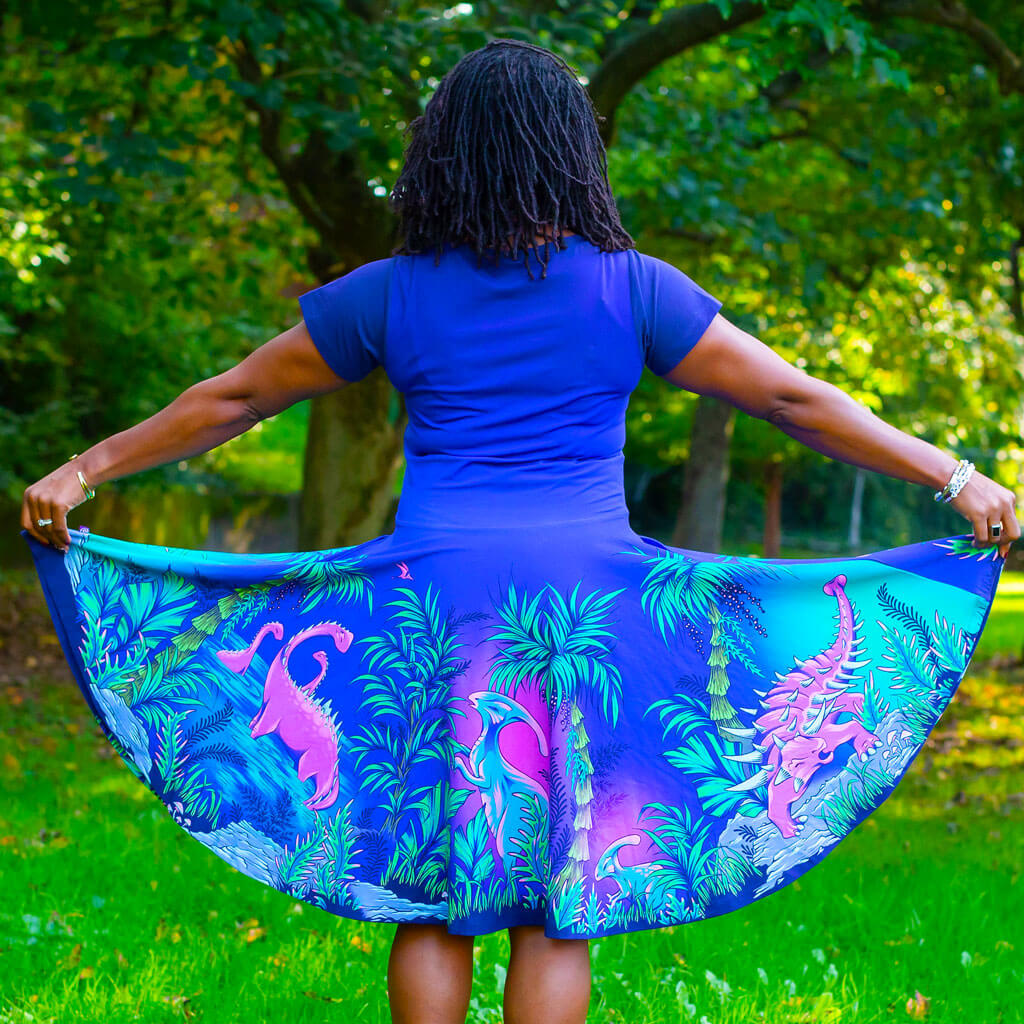 Princess Awesome & Boy Wonder Adult Dinosaurs Super Twirler Dress with Pockets — Princess Awesome & Boy Wonder branding close-up