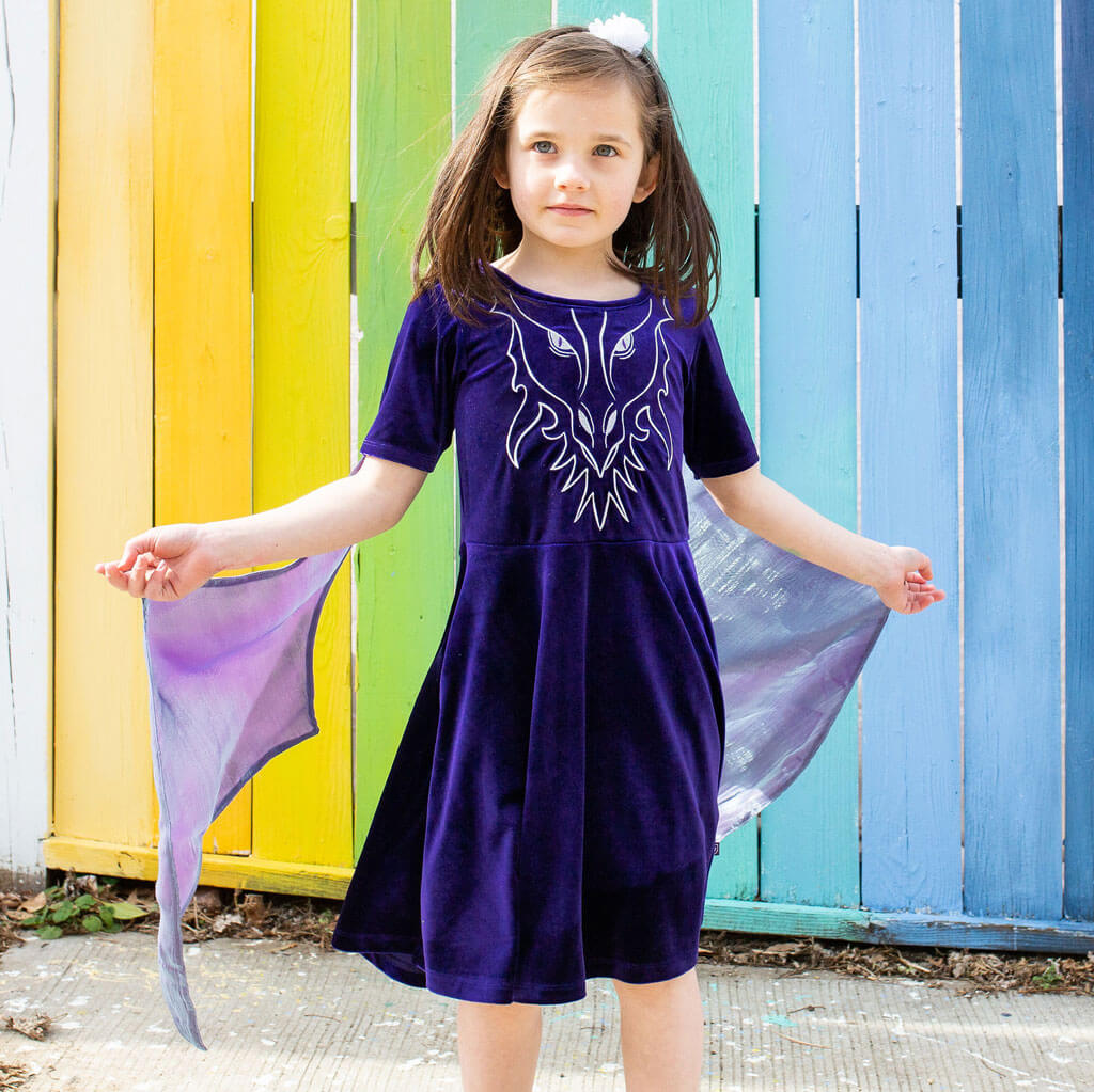 Princess Awesome & Boy Wonder Dragon Ballerina Style Short Sleeve Dress with Pockets and Detachable Wings — Princess Awesome & Boy Wonder branding close-up