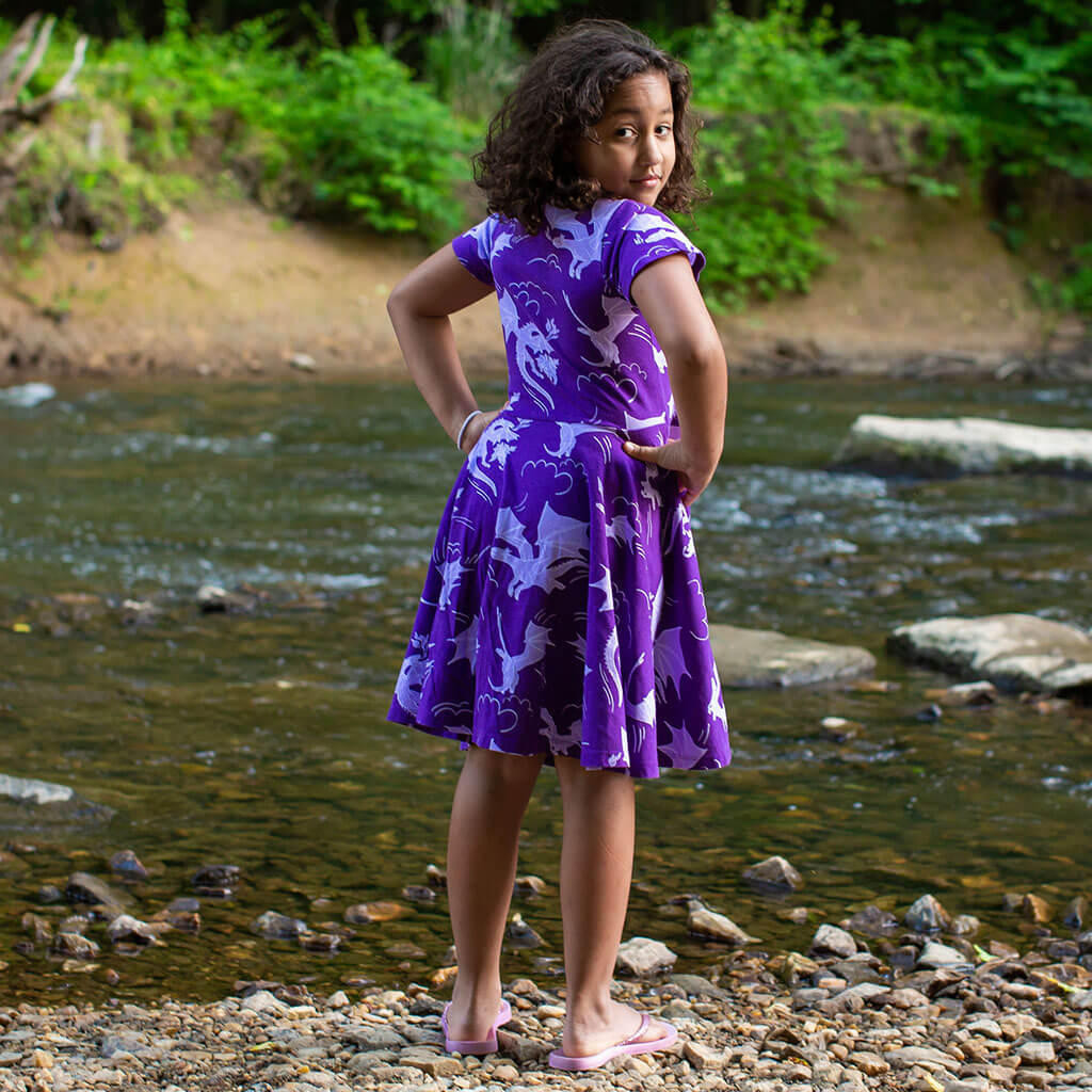 Princess Awesome & Boy Wonder "Purple Reign" Dragons Short Sleeve Super Twirler Play Dress with Pockets — lifestyle worn / used context