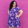 Princess Awesome & Boy Wonder Adult "Purple Reign" Dragons Short Sleeve Super Twirler Dress with Pockets — main product shot