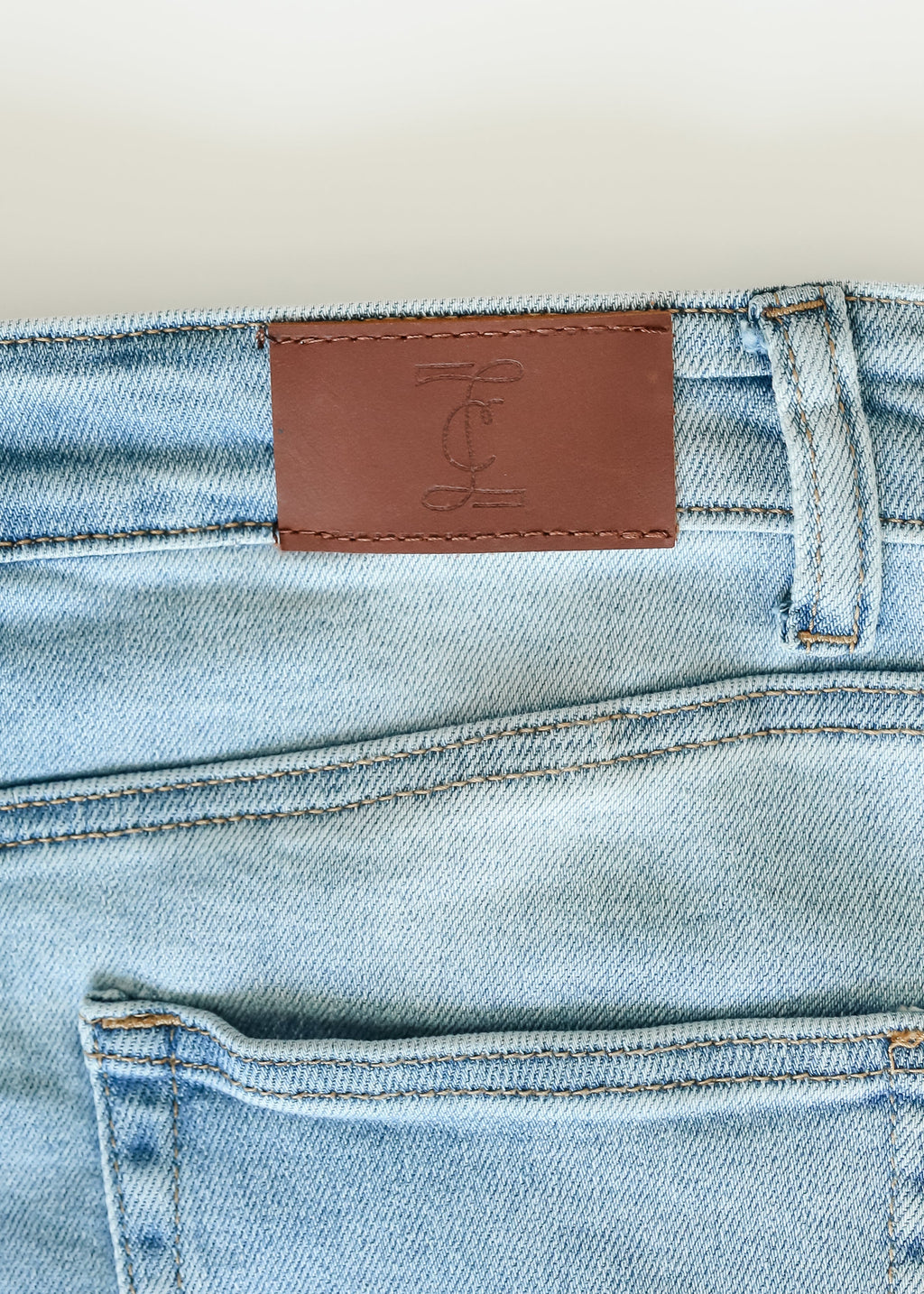 Inherit Co. Drew Raw Hem Midi Denim Skirt — lifestyle context