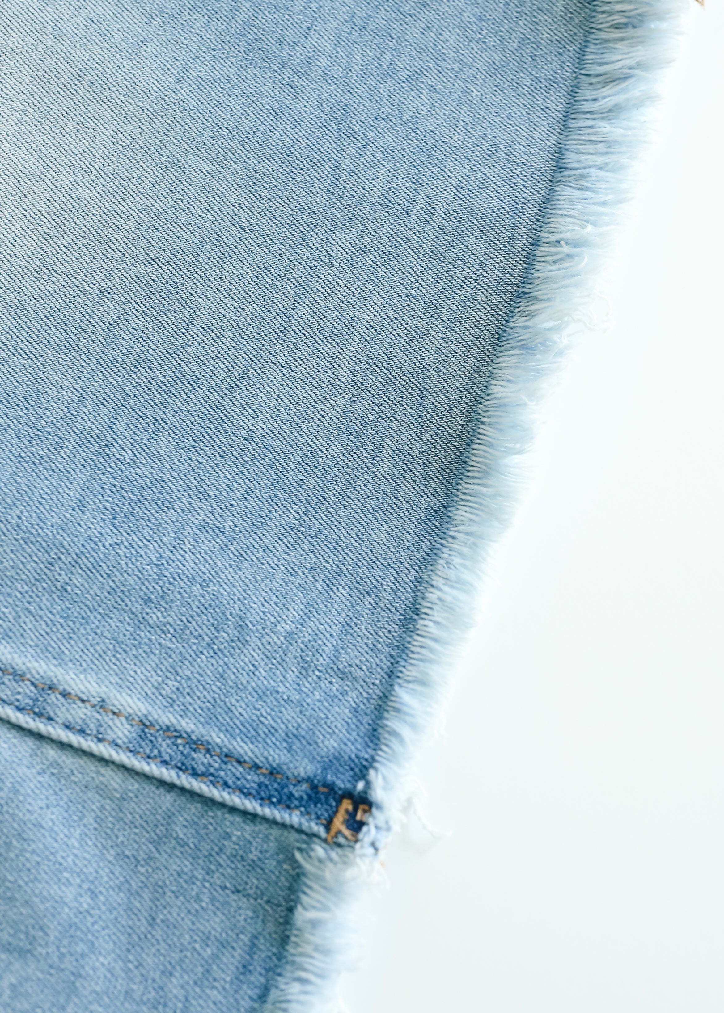Inherit Co. Drew Raw Hem Midi Denim Skirt — detail close-up