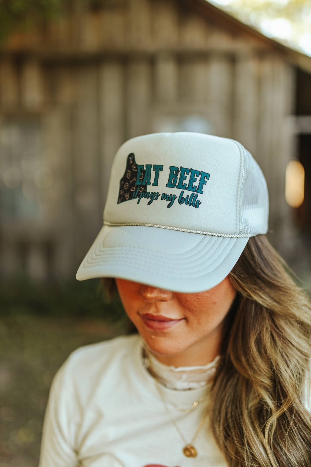 Wild Junkie Eat Beef It Pays My Bills Trucker Hat — lifestyle context