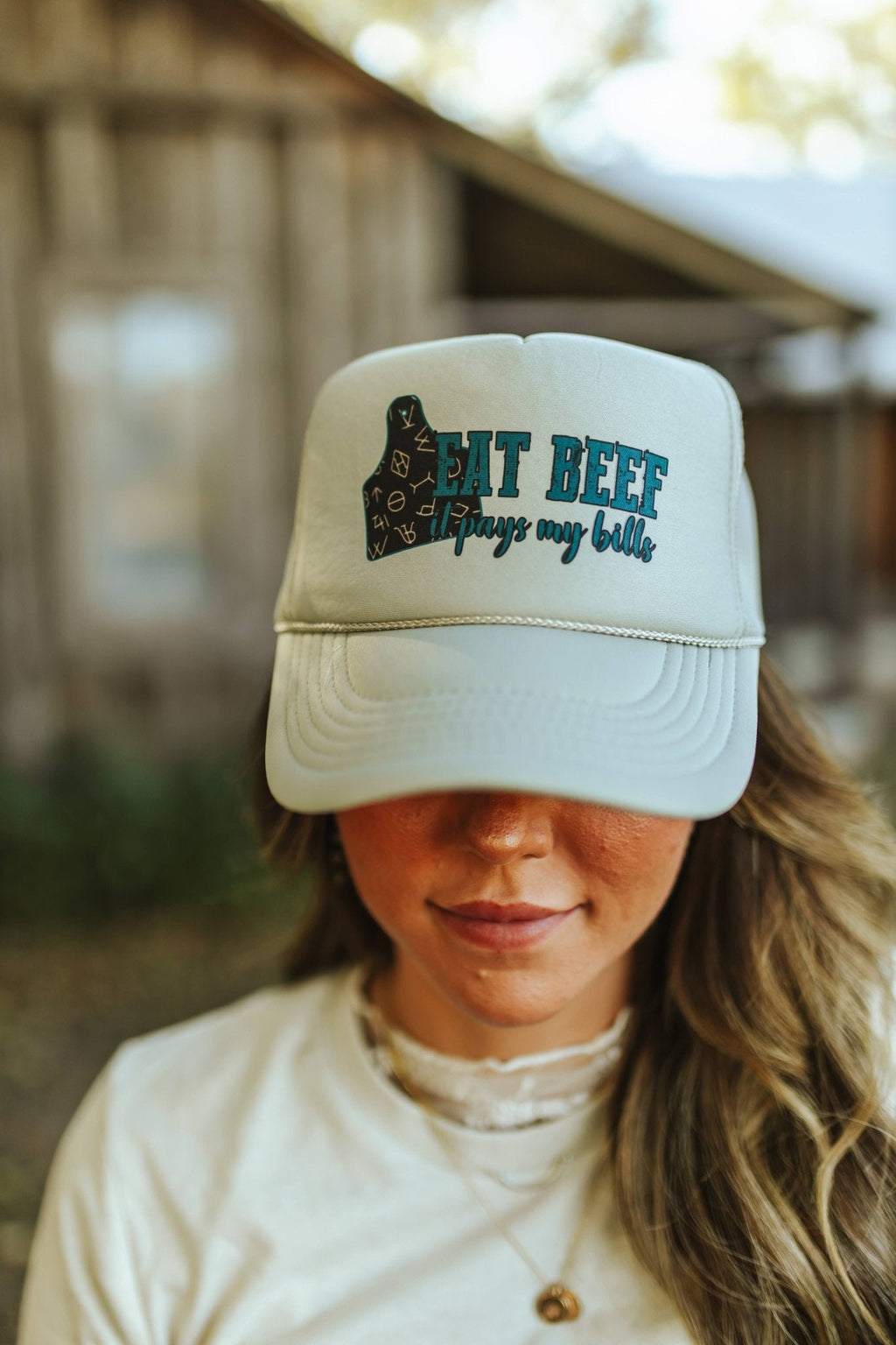 Wild Junkie Eat Beef It Pays My Bills Trucker Hat — detail close-up