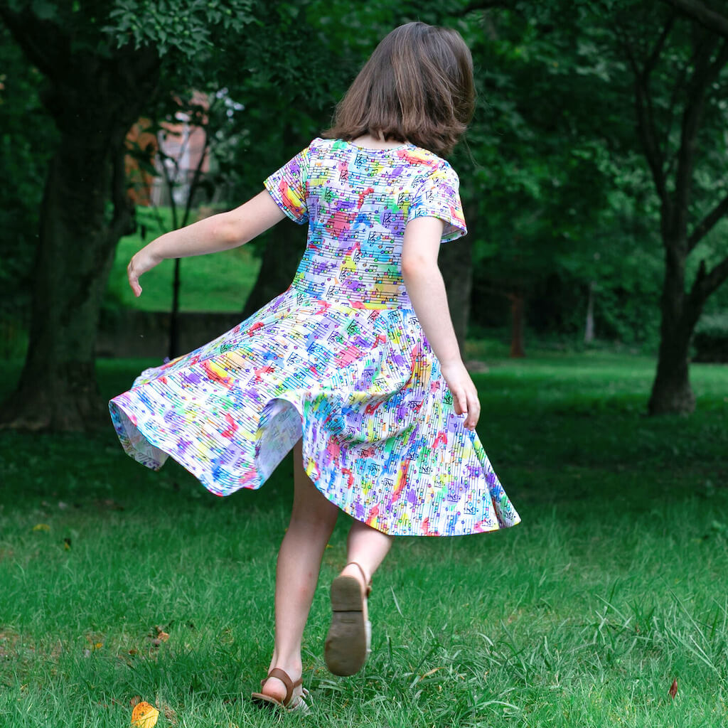Princess Awesome & Boy Wonder "Staff Meeting" Rainbow Music Notes Super Twirler Dress with Pockets — lifestyle context