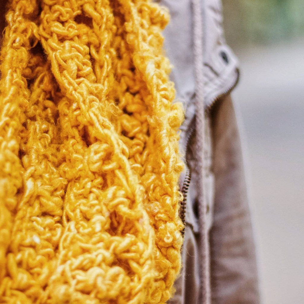 Darn Good Yarn Darn Good Yarn Elderidge Ribbed Banana Cowl Crochet Kit — Darn Good Yarn branding close-up