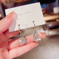 Mariam's Collection Elegant Sparkling Dangle  Rhinestone Earrings (MAC324) — lifestyle worn / used context