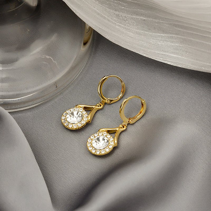 Mariam's Collection Elegant Sparkling Dangle  Rhinestone Earrings (MAC324) — Mariam's Collection branding close-up