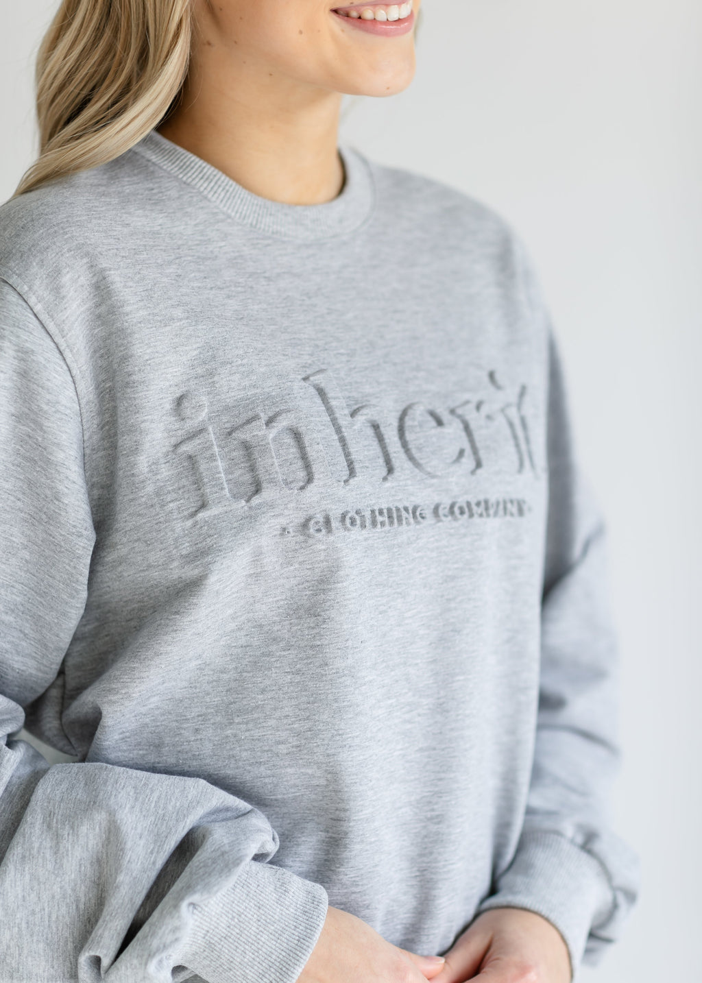 Inherit Co. Embossed Inherit Logo Crewneck Sweatshirt — in-use photo