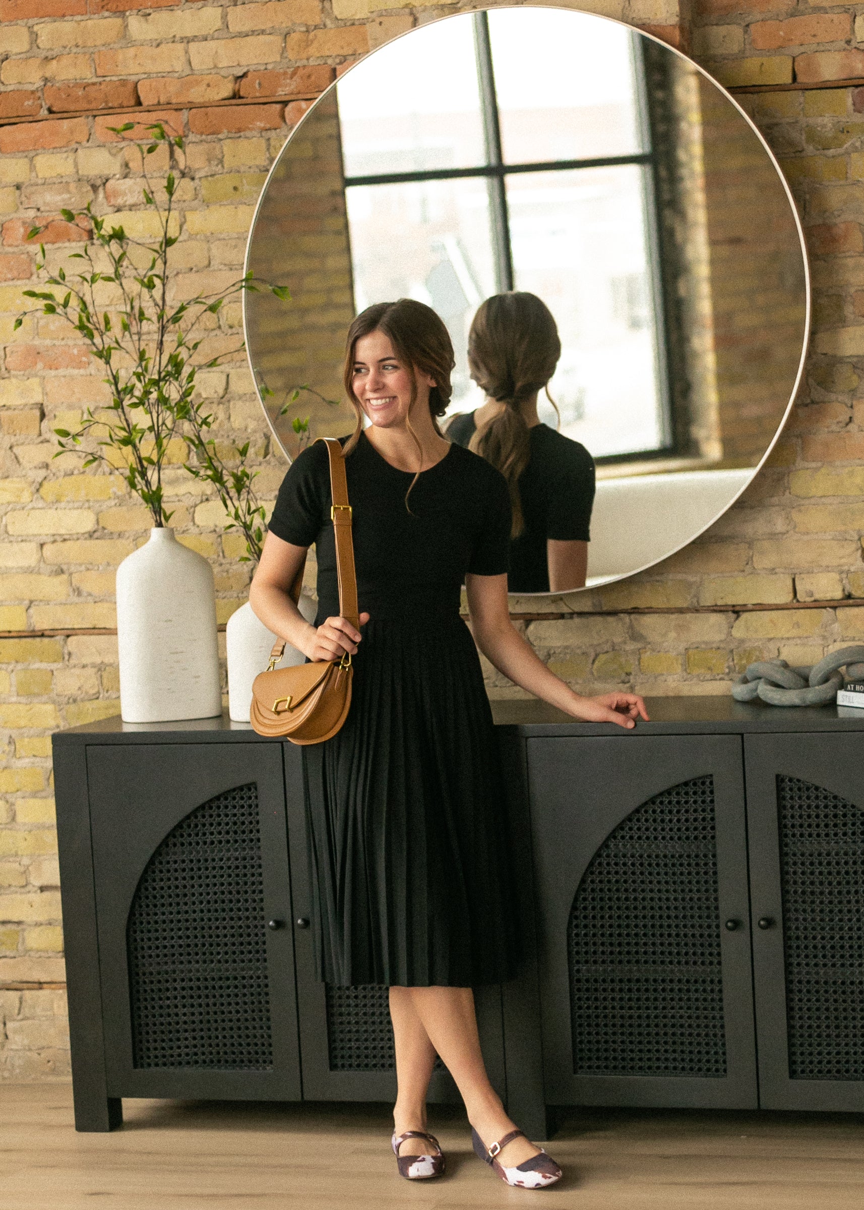 Inherit Co. Emersyn Black Pleated Midi Dress — packaging