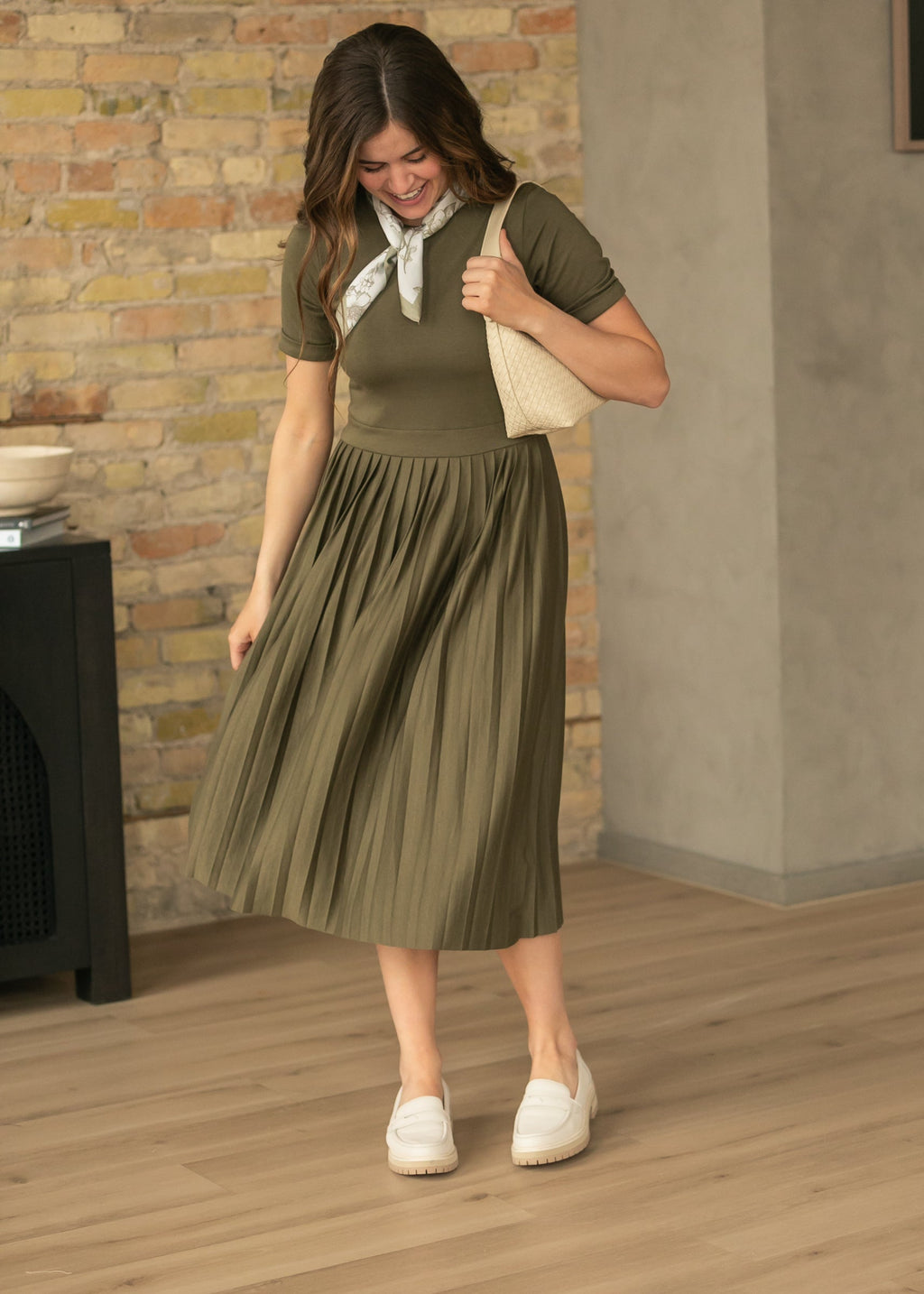 Inherit Co. Emersyn Olive Pleated Midi Dress — lifestyle context