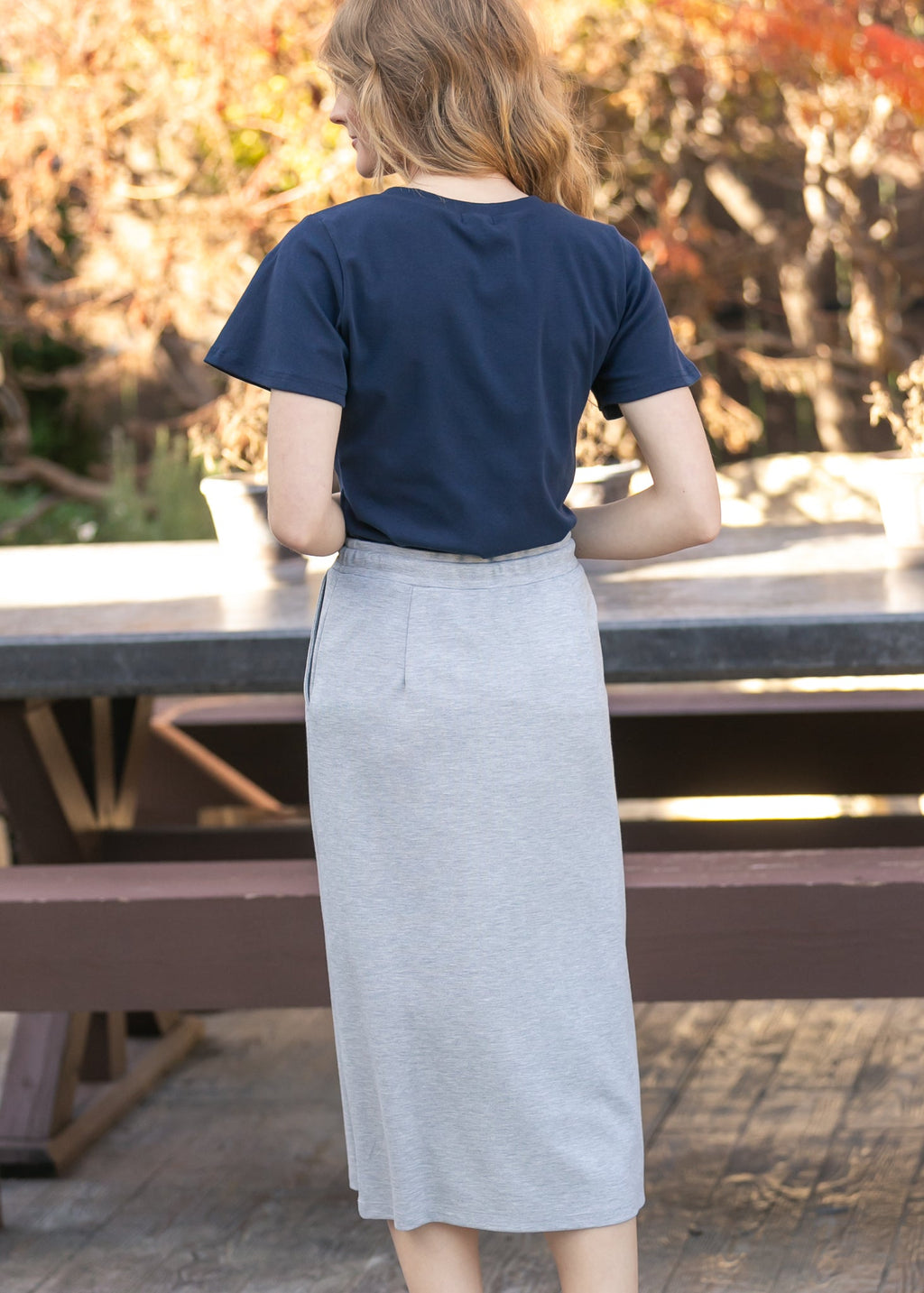 Inherit Co. Essential Navy Flutter Sleeve Top — flat-lay composition