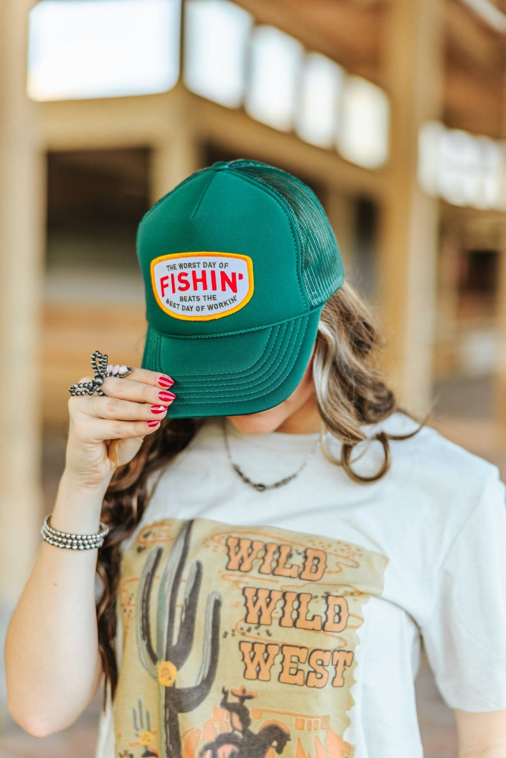Wild Junkie Fishin' Beats Workin' Patch Trucker Hat — main product shot