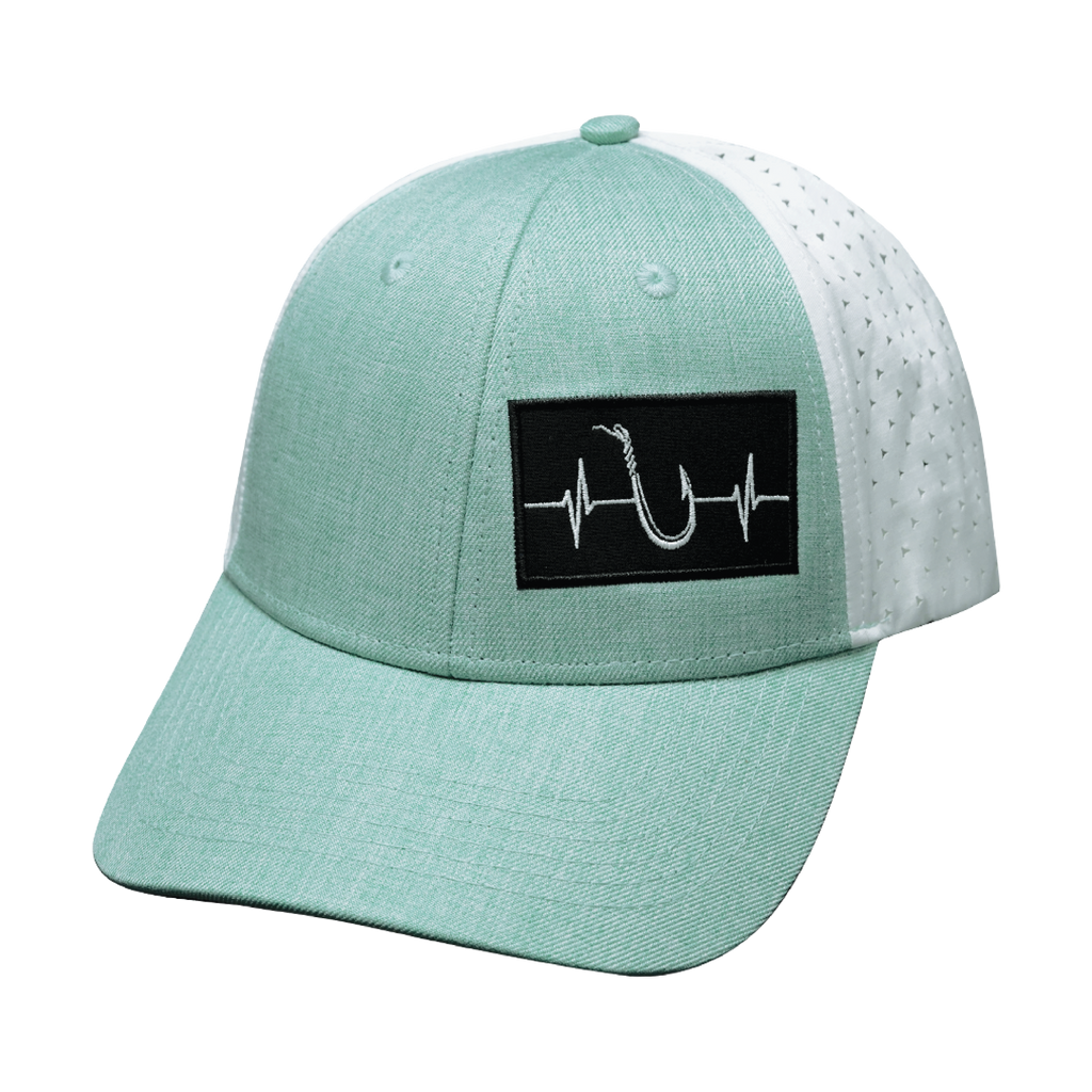 The Heartbeat Brand Fishing Hat - Low Profile - Ponytail - Teal / White - Laser Mesh — in-use photo
