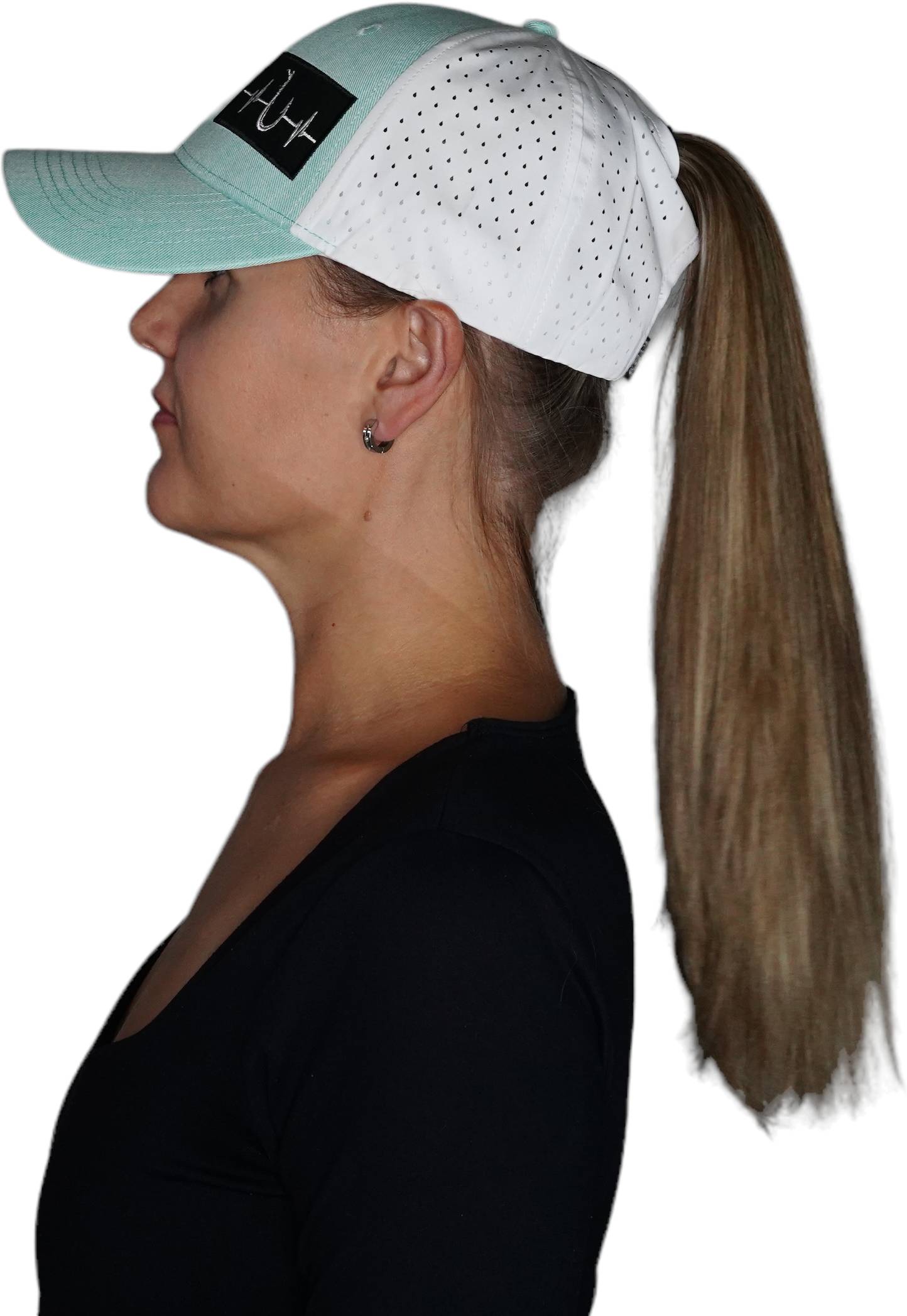 The Heartbeat Brand Fishing Hat - Low Profile - Ponytail - Teal / White - Laser Mesh — lifestyle context